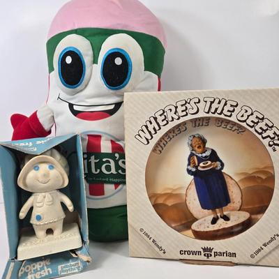 LOT 99: Rita's Mascot Plush Toy, Pillsbury Playthings Poppie Fresh Figure in Original Box, and 1984 Wendy’s Collectors Plate