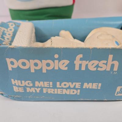 LOT 99: Rita's Mascot Plush Toy, Pillsbury Playthings Poppie Fresh Figure in Original Box, and 1984 Wendy’s Collectors Plate