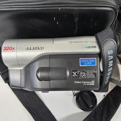 LOT 106: Four Vintage Camcorders with Cases