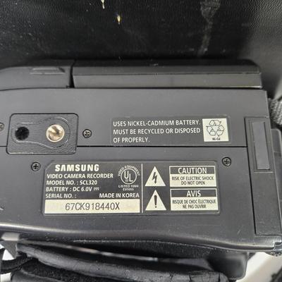 LOT 106: Four Vintage Camcorders with Cases