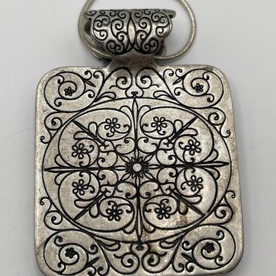 Art deco pendant and Lunere reversible pendant