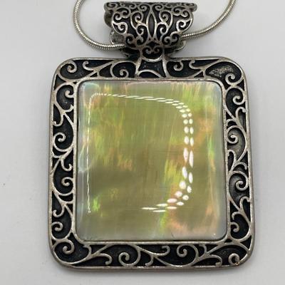 Art deco pendant and Lunere reversible pendant