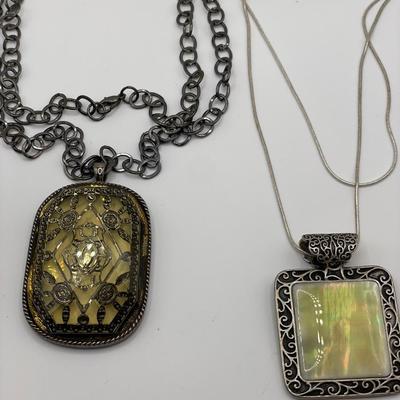Art deco pendant and Lunere reversible pendant
