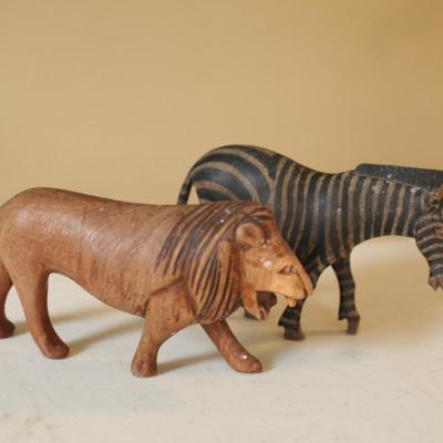 Sale Photo Thumbnail #44: Handcarved zebra and lion figurines