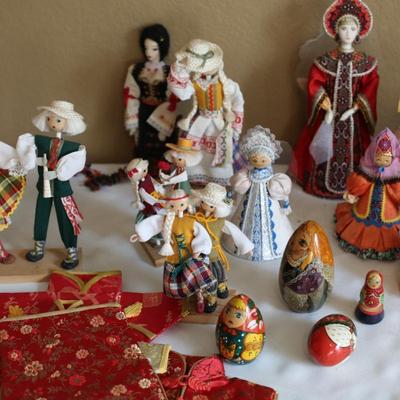 Sale Photo Thumbnail #83: Assorted folk art figurines and Russian Nesting Dolls