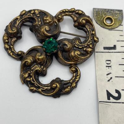 Lovely brass tone & green stone brooch