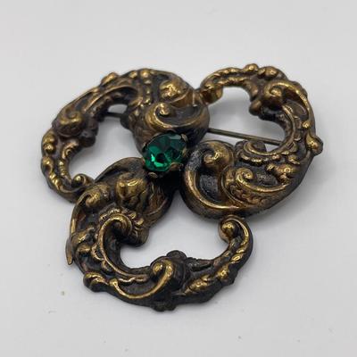 Lovely brass tone & green stone brooch