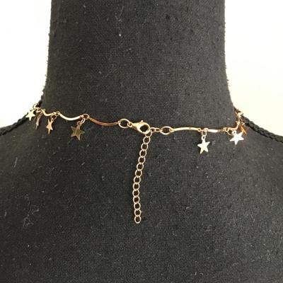 Cute gold tone, star necklace
