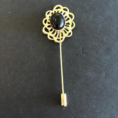 Sale Photo Thumbnail #137: Vintage Gold Tone stick pin with faux black stone Please see attached photos