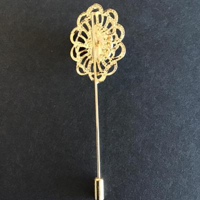 Sale Photo Thumbnail #139: Vintage Gold Tone stick pin with faux black stone Please see attached photos