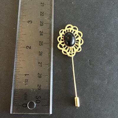 Sale Photo Thumbnail #138: Vintage Gold Tone stick pin with faux black stone Please see attached photos