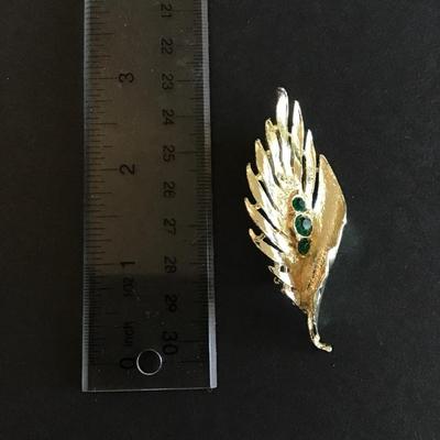 Sale Photo Thumbnail #163: Vintage Gold Tone Fashion Brooch with green Rhinestones Please see attached photos