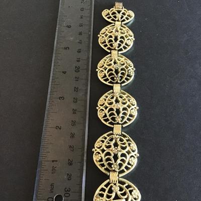 Sale Photo Thumbnail #174: Vintage Gold Tone Bracelet 
Has some wear blemishes please see attached photos