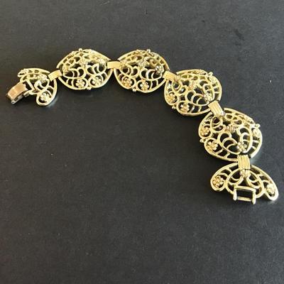 Sale Photo Thumbnail #176: Vintage Gold Tone Bracelet 
Has some wear blemishes please see attached photos