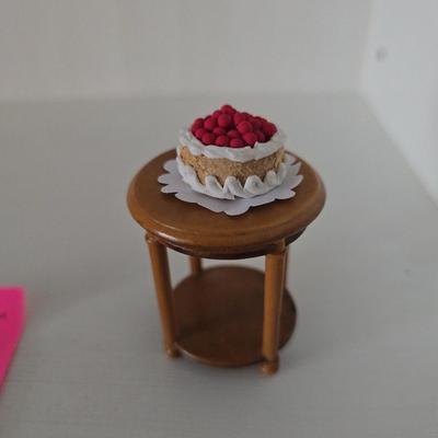 Wooden table with cake