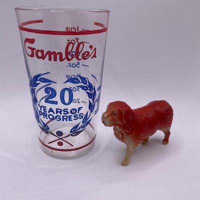 Gamble’s measure cup with plastic dog
