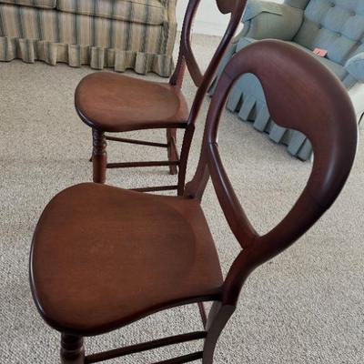 Sale Photo Thumbnail #3: A truly exceptional opportunity to acquire a magnificent pair of original Victorian Balloon Back side chairs, steeped in history and presented in a rare, prestigious condition. Dating precisely to the mid-19th century (circa 1840-1860), these chairs are a