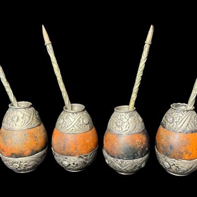 Sale Photo Thumbnail #423: Set of four. The trim on the gourds and the straws is Alpaca. Measurement: 3.5”H (gourds, each). Pre-auction estimate: $75-$100. [BK]