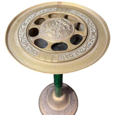 Sale Photo Thumbnail #446: Brass construction. There is green veneer on the post. There is a two-piece removable insert. This has an open work Asian motif, including a dragon chasing a pearl. Age related wear. Measurement: 21.5”H x 10.5”W. [BK]