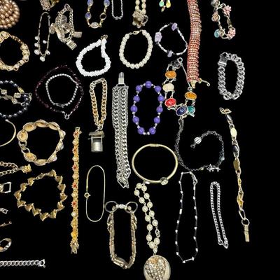 Sale Photo Thumbnail #468: Includes gold tone, silver tone, beads, stones, faux pearls, and more. Styles include cuff, bangle, chain, and others. Total of 40+ pieces. [BK]