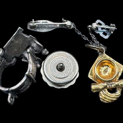Sale Photo Thumbnail #475: [10.30g] Includes a pin, a charm, and more. Total of four pieces. Silver content confirmed using the Niton XRF precious metals analyzer. [BK]