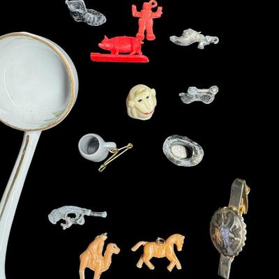 Sale Photo Thumbnail #484: Includes lighters, a tin litho noisemaker, watches, miniatures, and more. Total of 30+ pieces. Watches and lighters not tested. [BK]