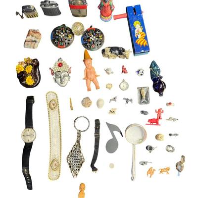 Sale Photo Thumbnail #482: Includes lighters, a tin litho noisemaker, watches, miniatures, and more. Total of 30+ pieces. Watches and lighters not tested. [BK]