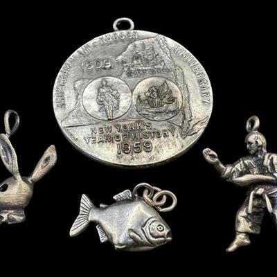 Sale Photo Thumbnail #492: [17.89g] Includes three charms and a pendant. Silver content confirmed using Niton XRF precious metals analyzer. [BK]