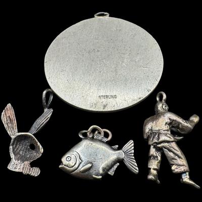 Sale Photo Thumbnail #493: [17.89g] Includes three charms and a pendant. Silver content confirmed using Niton XRF precious metals analyzer. [BK]