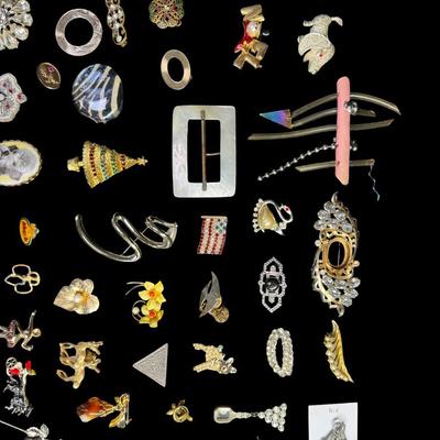 Sale Photo Thumbnail #497: Includes gold tone, silver tone, beads, stones, religious, patriotic, seasonal, and more. Total of 100+ pieces. [BK]