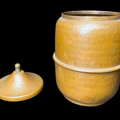 Sale Photo Thumbnail #508: This tea caddy is constructed of hand hammered copper, and has a beautiful patina. There are no dents. Measurement: 7”H x 4.25”W. Pre-auction estimate: $25-$50. [BK]