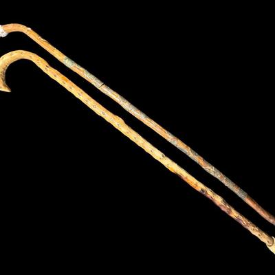 Sale Photo Thumbnail #538: Includes two canes. One is a European piece with destination badges throughout. The other is believed to be hand carved. Some badges are loose on the European cane. Measurement of longest: 36.5”L. [PT]