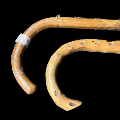 Sale Photo Thumbnail #539: Includes two canes. One is a European piece with destination badges throughout. The other is believed to be hand carved. Some badges are loose on the European cane. Measurement of longest: 36.5”L. [PT]