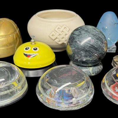 Sale Photo Thumbnail #542: Includes hand made paper weights, a ceramic Buddhist bowl, a brass scarab paperweight, an Arthur Court style glass egg, and more. Total of nine pieces. Age related wear. [BK]