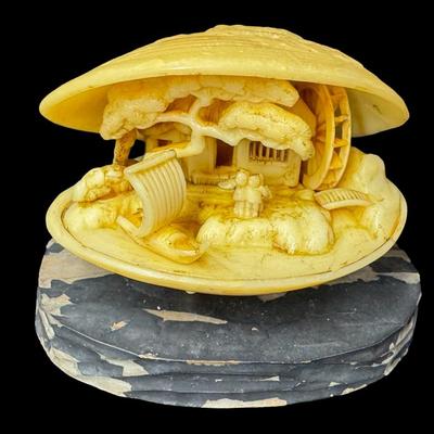 Sale Photo Thumbnail #546: Includes hand made paper weights, a ceramic Buddhist bowl, a brass scarab paperweight, an Arthur Court style glass egg, and more. Total of nine pieces. Age related wear. [BK]