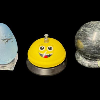 Sale Photo Thumbnail #545: Includes hand made paper weights, a ceramic Buddhist bowl, a brass scarab paperweight, an Arthur Court style glass egg, and more. Total of nine pieces. Age related wear. [BK]