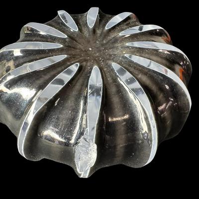 Sale Photo Thumbnail #554: Includes an NOS Baby Ben Westclox alarm clock, a Hummel, pig salt and pepper shakers, a crystal Virgin Mary, a paperweight, and more. Total of eight pieces. The paperweight is chipped (pictured). Measurement of tallest: 5”. [BK]