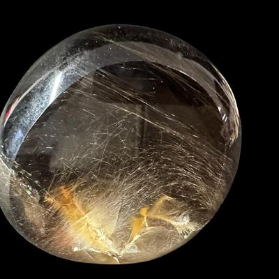 Sale Photo Thumbnail #557: Includes an NOS Baby Ben Westclox alarm clock, a Hummel, pig salt and pepper shakers, a crystal Virgin Mary, a paperweight, and more. Total of eight pieces. The paperweight is chipped (pictured). Measurement of tallest: 5”. [BK]