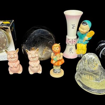 Sale Photo Thumbnail #558: Includes an NOS Baby Ben Westclox alarm clock, a Hummel, pig salt and pepper shakers, a crystal Virgin Mary, a paperweight, and more. Total of eight pieces. The paperweight is chipped (pictured). Measurement of tallest: 5”. [BK]