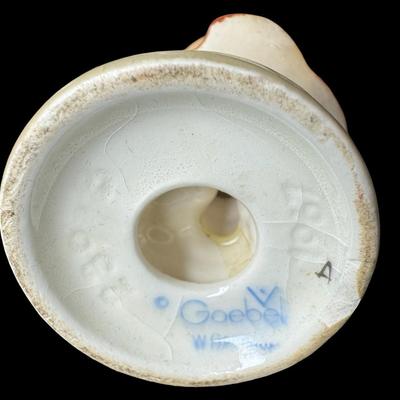 Sale Photo Thumbnail #555: Includes an NOS Baby Ben Westclox alarm clock, a Hummel, pig salt and pepper shakers, a crystal Virgin Mary, a paperweight, and more. Total of eight pieces. The paperweight is chipped (pictured). Measurement of tallest: 5”. [BK]