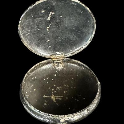 Sale Photo Thumbnail #561: Includes three perfumes, a silver tone trinket box with pink glass insert, and an enamelware Toleware metal trinket box. There is age related wear and minimal paint loss to the Toleware piece. The two pink perfume bottles have damaged stoppers. [BK]