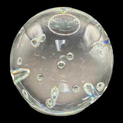 Sale Photo Thumbnail #579: This piece features controlled bubbles inside of blown glass. It is illegibly signed on the base. Measurement: 5.5” Diameter.  [BK]