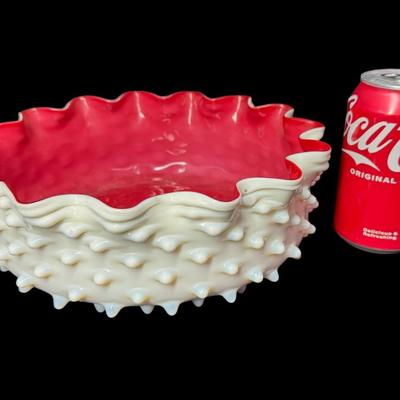 Sale Photo Thumbnail #589: Most likely from the 19th century. This piece features a hobnail pattern. It has ruffled and crimped edges. It is unsigned and similar to other pieces of this era. There is one chip on a hobnail (pictured). Measurement: 10” Diameter x 3.5”H. [BK]