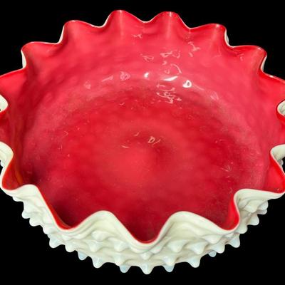 Sale Photo Thumbnail #588: Most likely from the 19th century. This piece features a hobnail pattern. It has ruffled and crimped edges. It is unsigned and similar to other pieces of this era. There is one chip on a hobnail (pictured). Measurement: 10” Diameter x 3.5”H. [BK]
