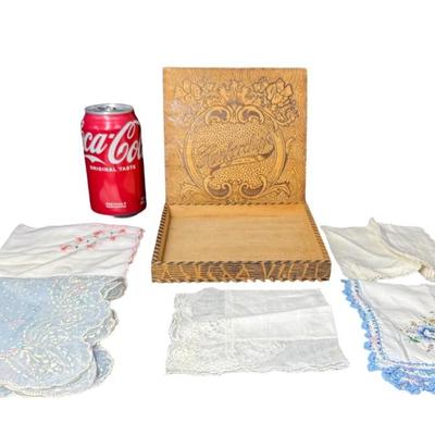 Sale Photo Thumbnail #598: This piece is pyrography scrolled and ornately decorated with an Art Nouveau motif. It is beautifully decorated with red and light green shading on the surface. There is a warp of the lid, but the hinge works correctly. Also includes five vintage handkerc