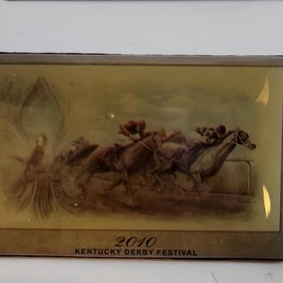Sale Photo Thumbnail #228: This lot is for a Collection of Vintage KY Derby Memorabilia & Metal Pins.  This grouping includes metal pins sanctioned by Churchill Downs and other items like a Thunder Pin, Thunder Glasses, a Belmont Stakes Pin and another from a Breeders Cup.  Great l