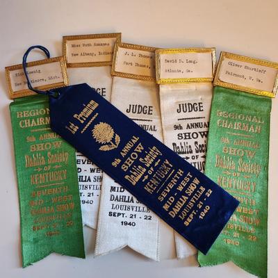 Sale Photo Thumbnail #235: This lot is for a grouping of Vintage Dahlia Society Show Ribbons. The judges worn these as they chose their blue ribbon winners.  Nice collection of items from the 1940s.  There are six ribbons in the lot. Great from many uses.  Where you gonna find 'em.
