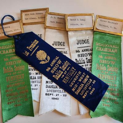 Sale Photo Thumbnail #237: This lot is for a grouping of Vintage Dahlia Society Show Ribbons. The judges worn these as they chose their blue ribbon winners.  Nice collection of items from the 1940s.  There are six ribbons in the lot. Great from many uses.  Where you gonna find 'em.