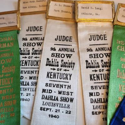 Sale Photo Thumbnail #238: This lot is for a grouping of Vintage Dahlia Society Show Ribbons. The judges worn these as they chose their blue ribbon winners.  Nice collection of items from the 1940s.  There are six ribbons in the lot. Great from many uses.  Where you gonna find 'em.