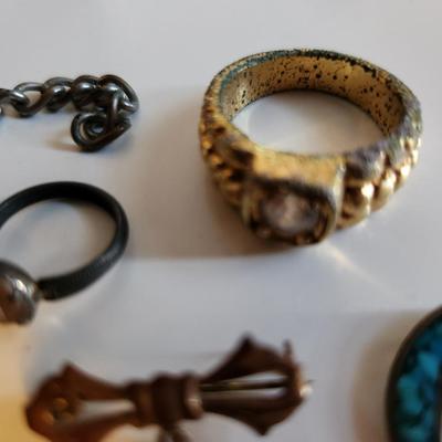 Sale Photo Thumbnail #245: This lot is for items we found in the Bottom of the Jewelry Box.  Several rings, tie clasps, pins and bars. Some interesting pieces that could be used for many purposes.
